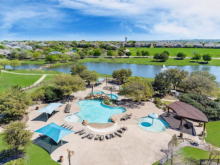 Lone Star Ranch community amenities are enviable! A resort-style swimming pool, fitness center, a clubhouse, hike & bike trails + a playground, fishing pond & zoned to outstanding Frisco Independent School District schools.