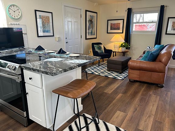 kitchen with huge breakfast bar and slide in range