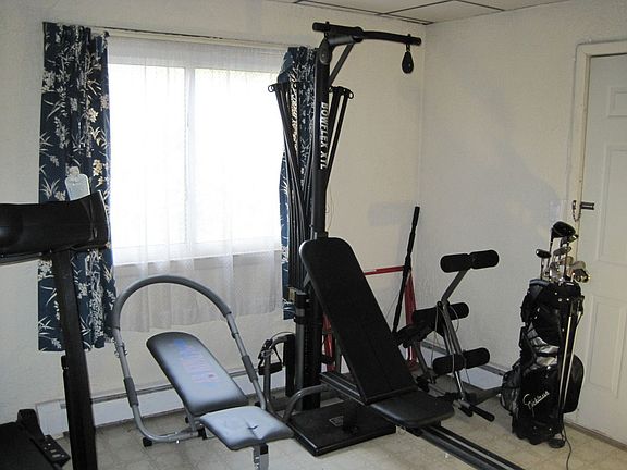 Bedroom #4 (use as gym, office, or spare)! Has a separate entrance to outdoors