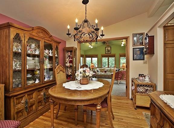 The formal dining room opens to family room, kitchen and living room.