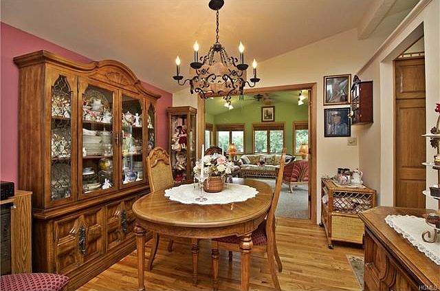 The formal dining room opens to family room, kitchen and living room.