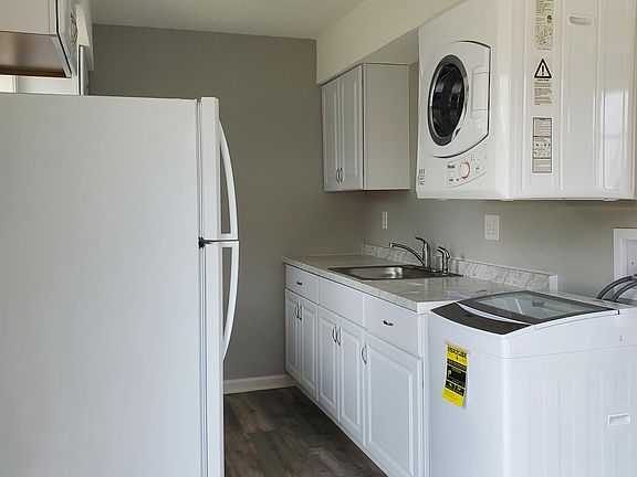 Kitchen comes with all new appliances and a compact washer and dryer