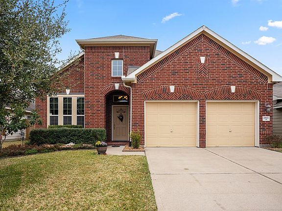 Beautiful brick elevation, with dual garages and dual driveway.