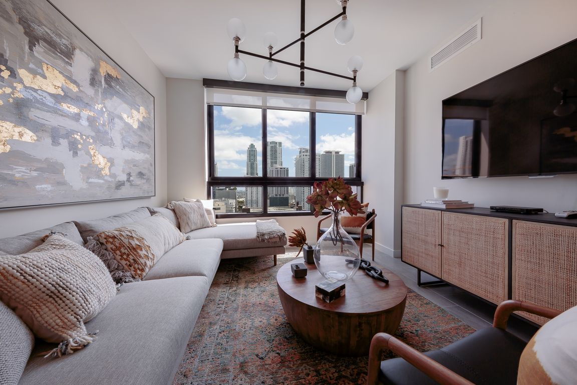 Living Room & Expansive Windows | Grand Station Miami