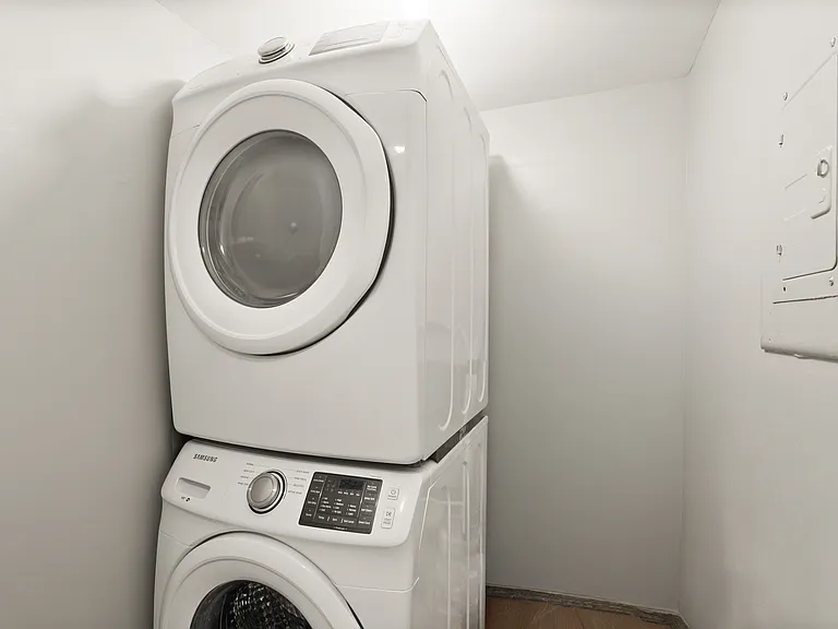 Convenient washer/dryer within steps of bedrooms. Separate storage walk-in closet (not pictured).