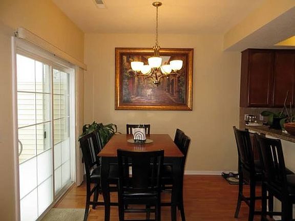 Dining Room & sliding patio door to full wrap-around porch w