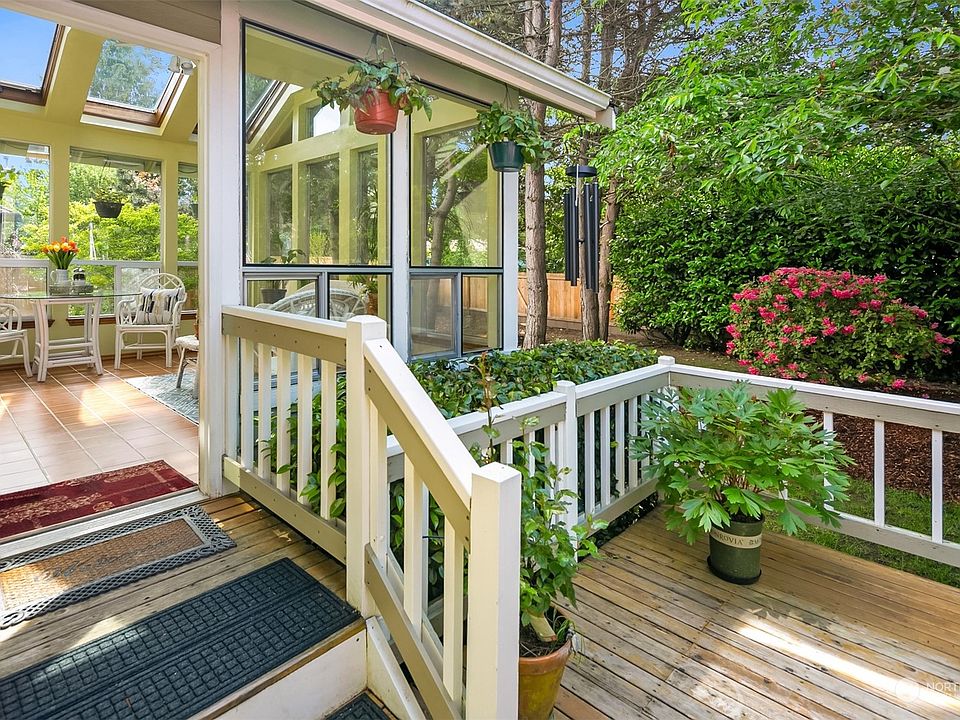 The backyard is overlooked by a beautiful atrium that brings the outside in yearround>