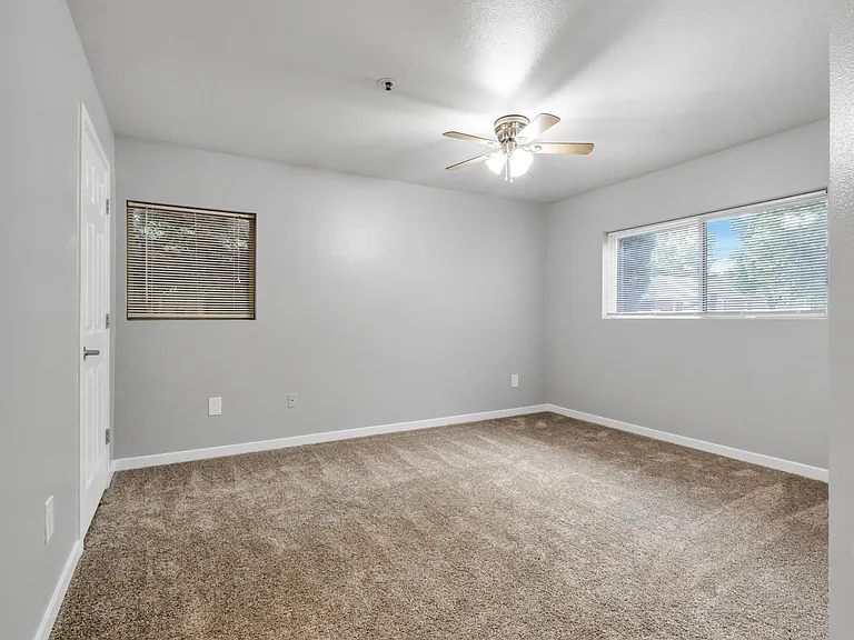 A Bedroom at The Buttes Apartment Homes in Loveland, CO