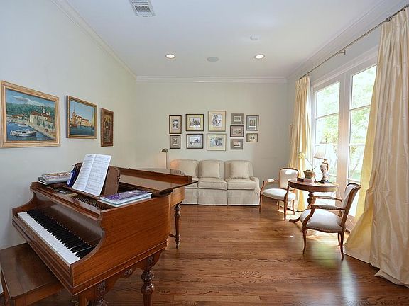 Formal living room is currently used as a music room. Could easily be used as an office