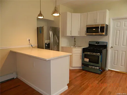 1182 E Tremont Ave #1 Photo 1