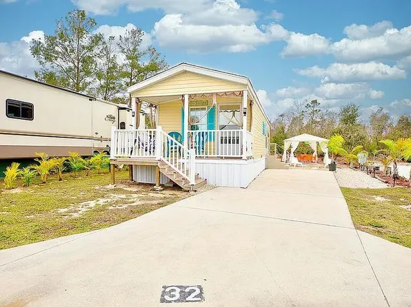 32 GRASSY LAKE CIRCLE, LAKE PLACID, FL 33852