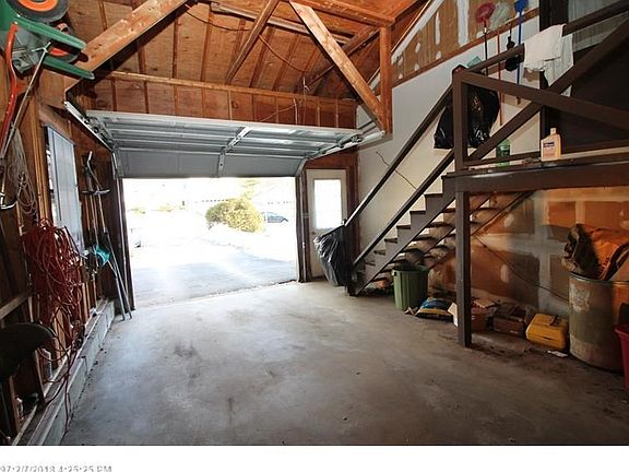 Good sized garage offering some storage options.