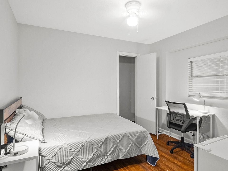 Bedroom 1 is 9'x11' 
Full size bed with work station