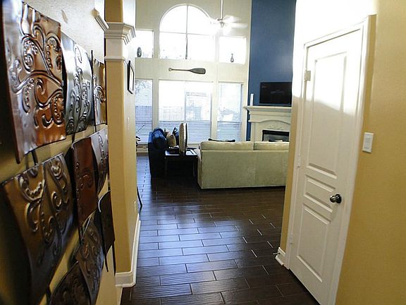 View into the family room with lots of natural light from the large windows