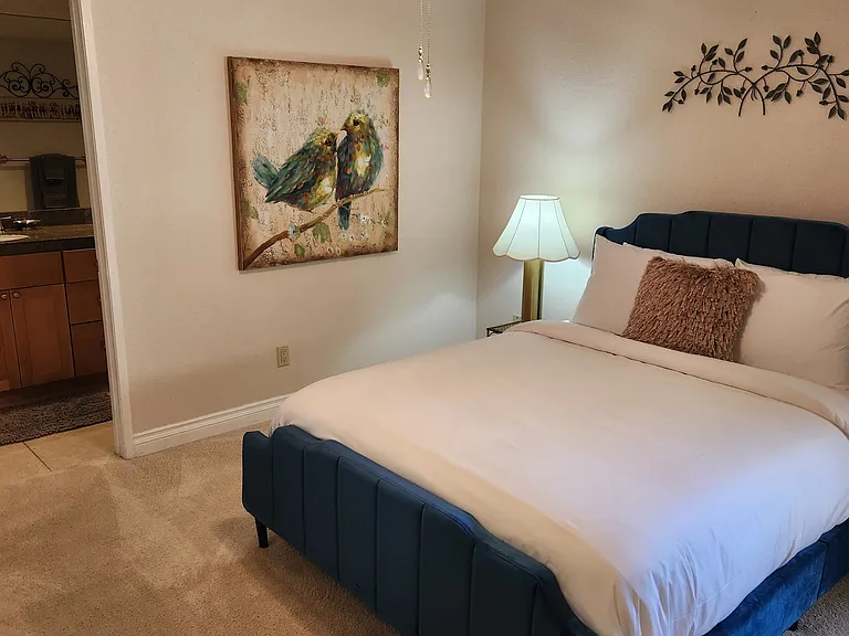 Bedroom 1 - Queen room with attached full shower & new smart TV