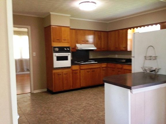 Kitchen With stove ~ oven ~ dishwasher and refrigerator 