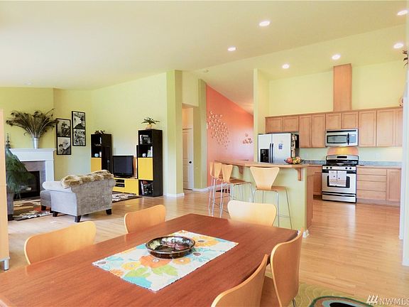Large kitchen with beech cabinetry plus pantry storage