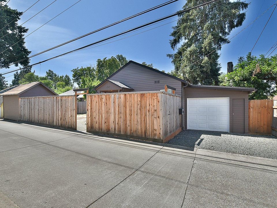 Fully fenced and gated, tucked away off the alley in the middle of the block.