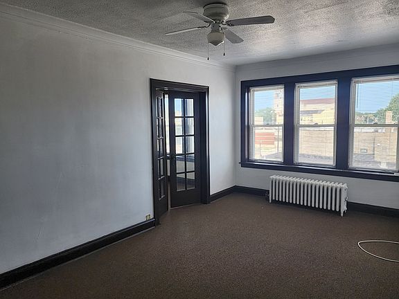 French doors allow you to close off kitchen and dining area from living room.