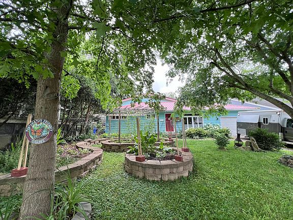 View of front yard/gardens from the street.