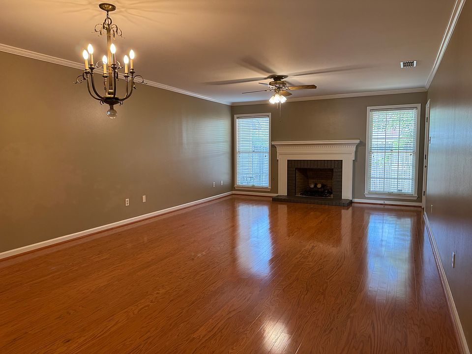 Living / Dining area with windows to the patio.