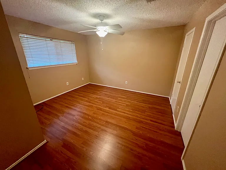 Master bedroom with an ensuite bathroom and large walk-in closet.