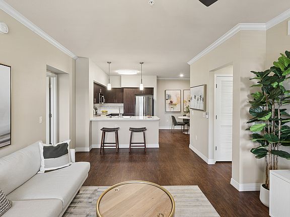 Step into a modern oasis at One North Scottsdale, where stylish interiors meet open-concept living. Enjoy the sleek kitchen and warm wood floors, all designed for comfort and celebration. Don't waitschedule your visit today!