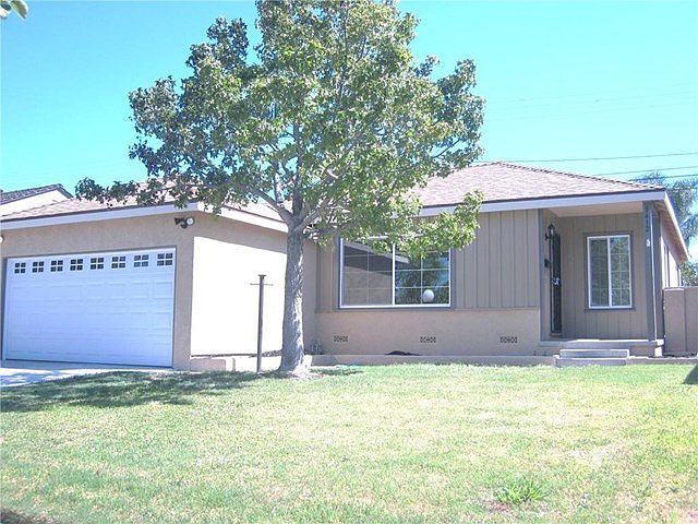 Nice Curb Appeal: Freshly painted exterior. New Garage Door (with automatic opener)