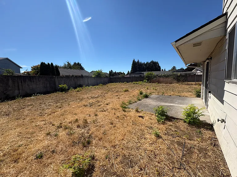 Large, fenced backyard