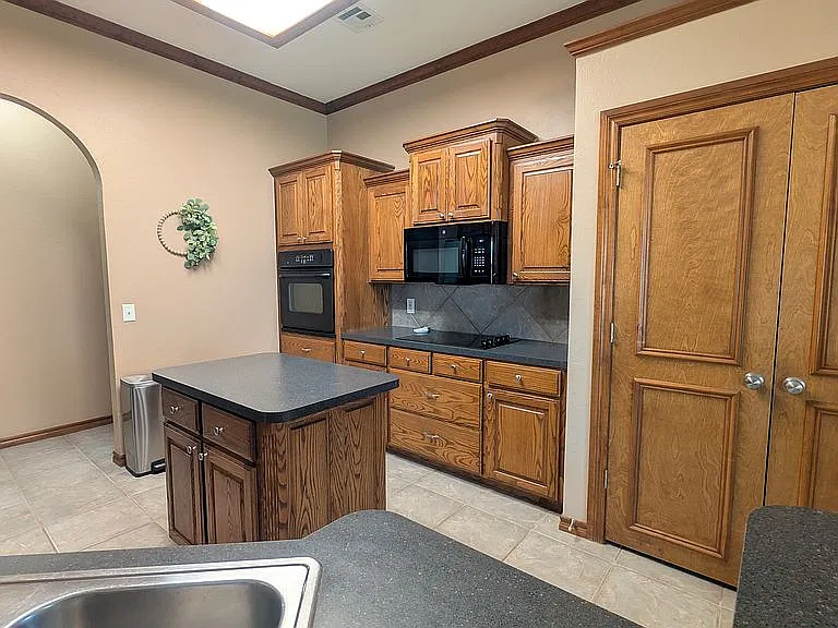 Welcome to this fully furnished 2,110-square-foot, 4-bedroom, 2-bathroom — Photo 4