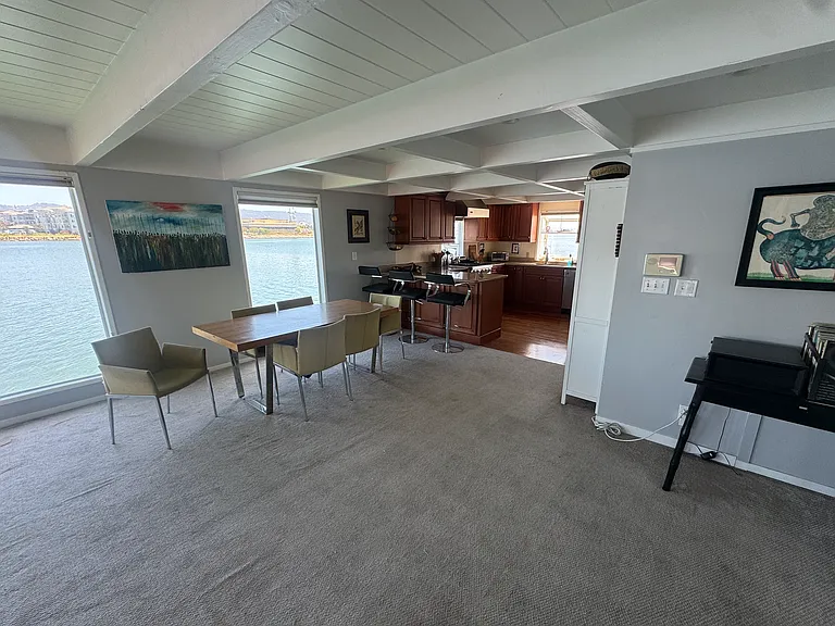 From front door looking to the right. Outgoing roommate is open to leaving much of this stuff and starting over himself, so...options. Fun fact: current housemate is getting another floating home near here and is going to move his stuff by boat. No joke