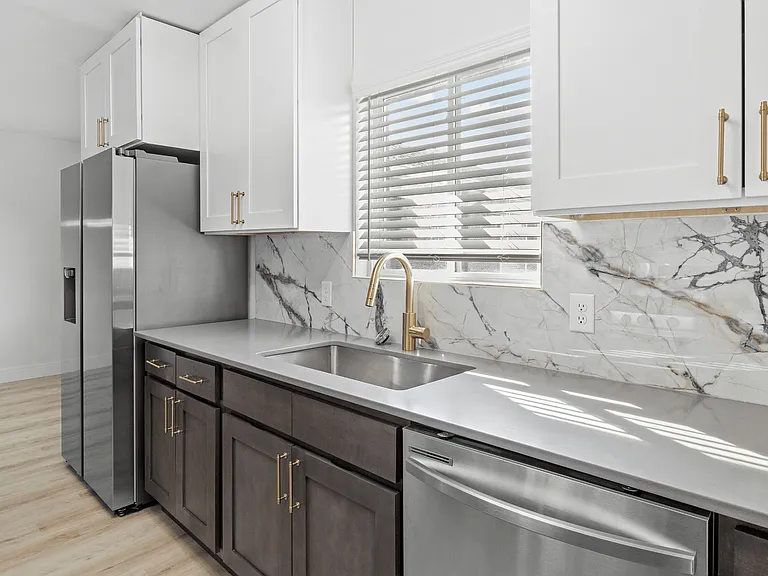 Quartz Countertops + Designer Backsplash Quartz Countertops + Designer Backsplash