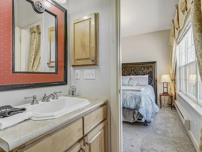 Full bathroom attached to bedroom