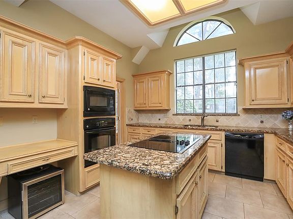 Beautiful granite and lot of storage in the kitchen.