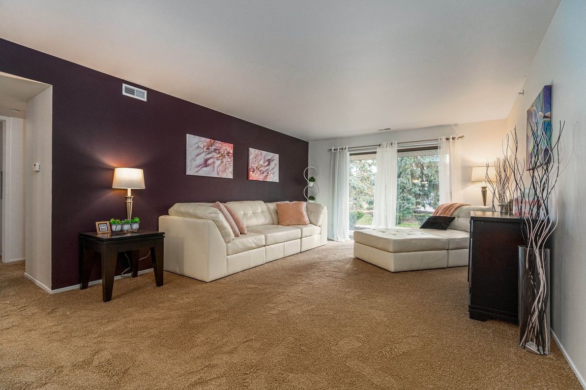 Spacious Living Room at Prentiss Pointe Apartments in Harrison Township, MI