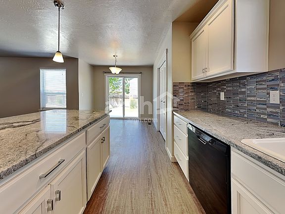 4th image of 9860 W Mossywood Dr