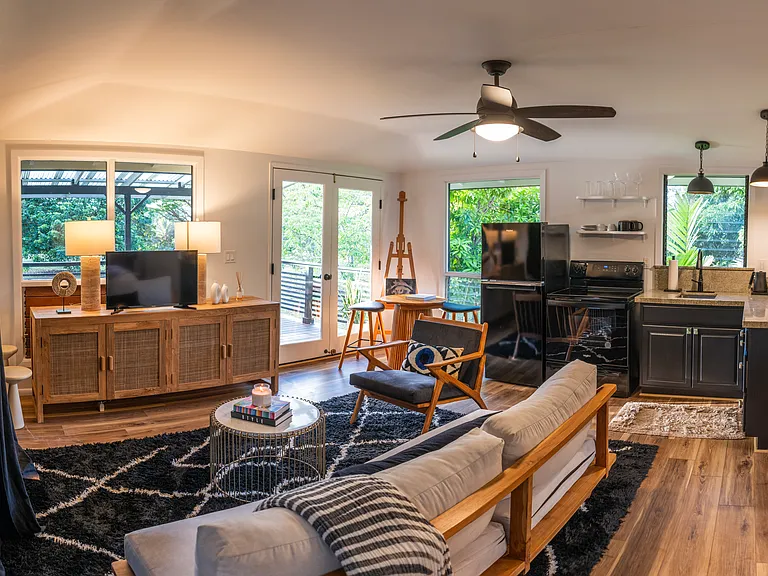 Kitchen and living room area. Very light and bright!