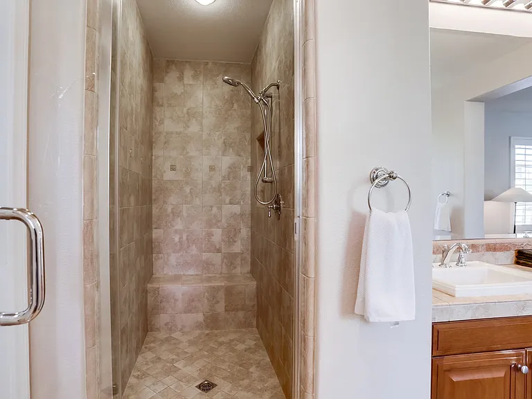Walk in shower in primary bedroom