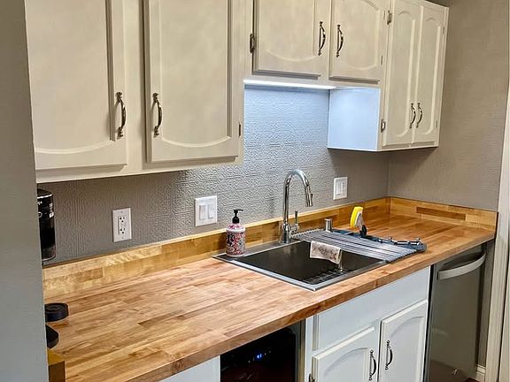 newly remodeled kitchen with butcher block counter tops