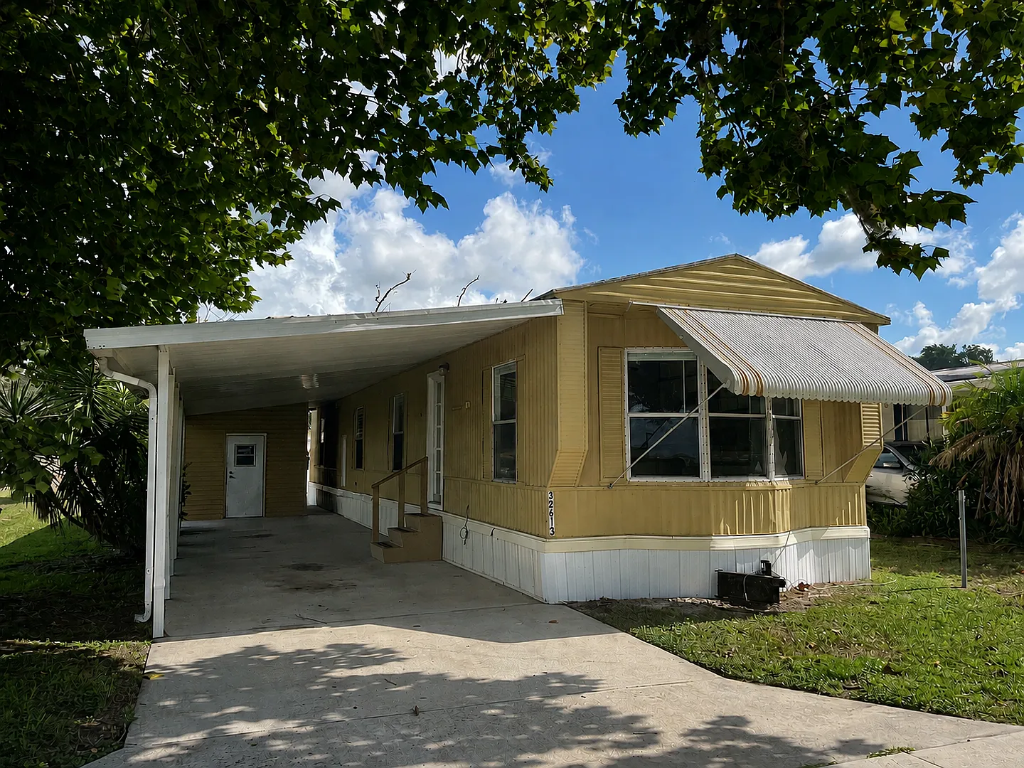 Updated 2BR/1BA Wesley Chapel Mobile Home w/ Carport Utilities Included! — Photo 1