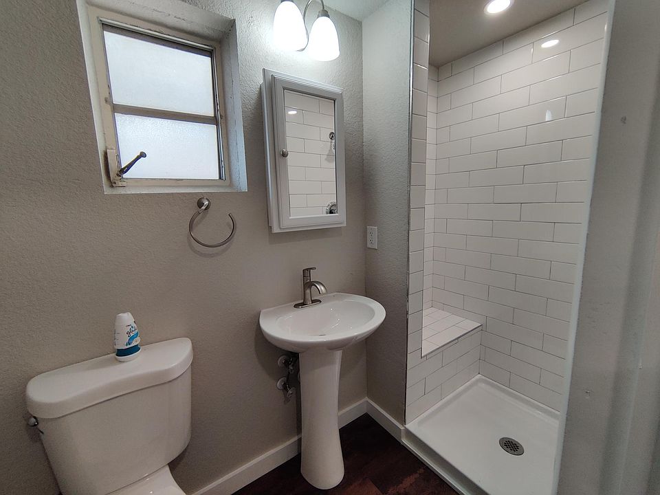 Bathroom (outdated photo - updated with hurricane impact window)