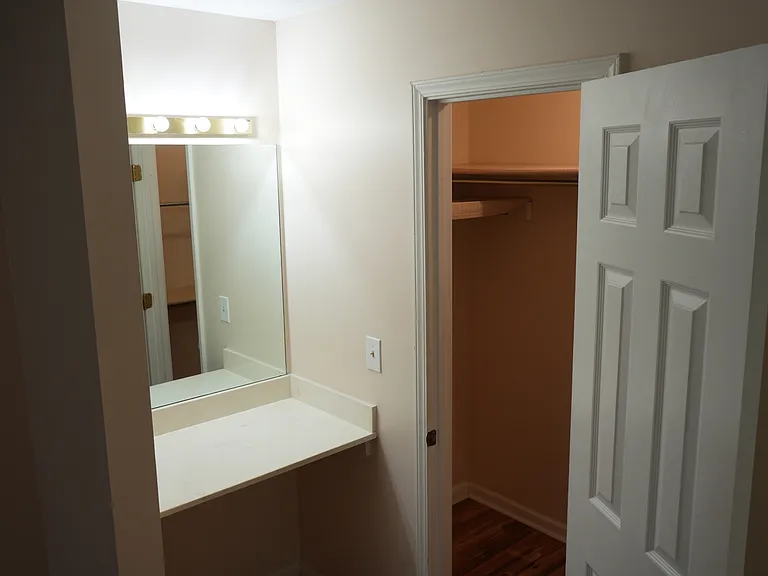 Main bedroom Vanity Desk with Lighted Mirror & leading to Walking-in Closet