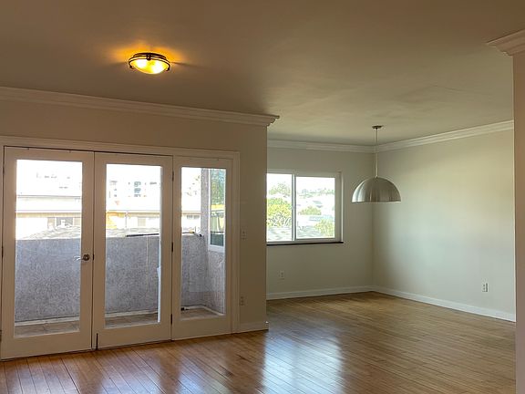 Great open living room to patio and dining area.