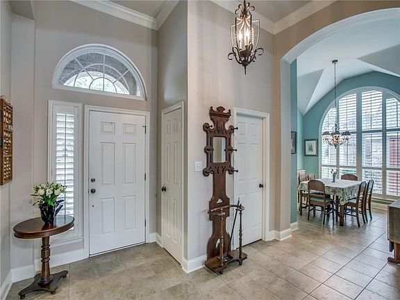 An inviting entry welcomes you to this beautiful and well-maintained one-story home.