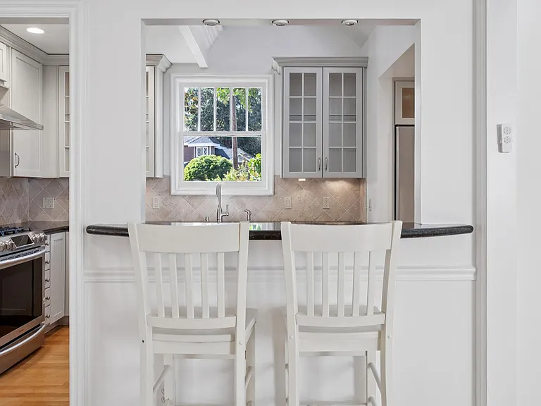 Bar seating off of the kitchen