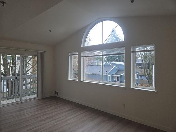 New hardwood flooring & vaulted ceilings.