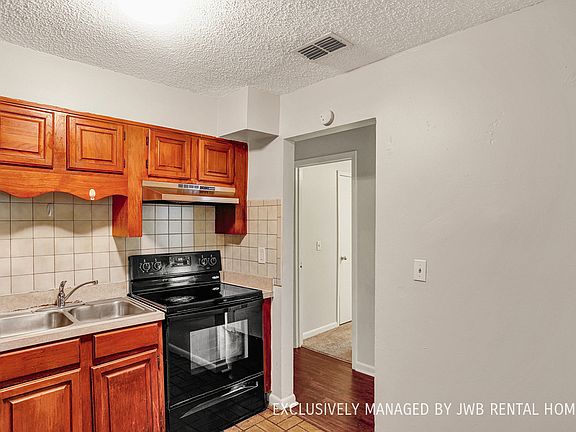 3rd image of 7410 John F Kennedy Dr W