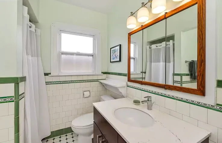 Bathroom has separate walk-in shower and vintage tub (not seen in photo)