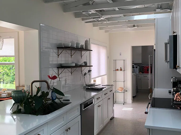 Galley Kitchen ,dishwasher garbage disposal.