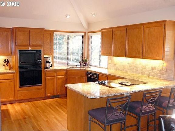 Kitchen w/ slab granite
